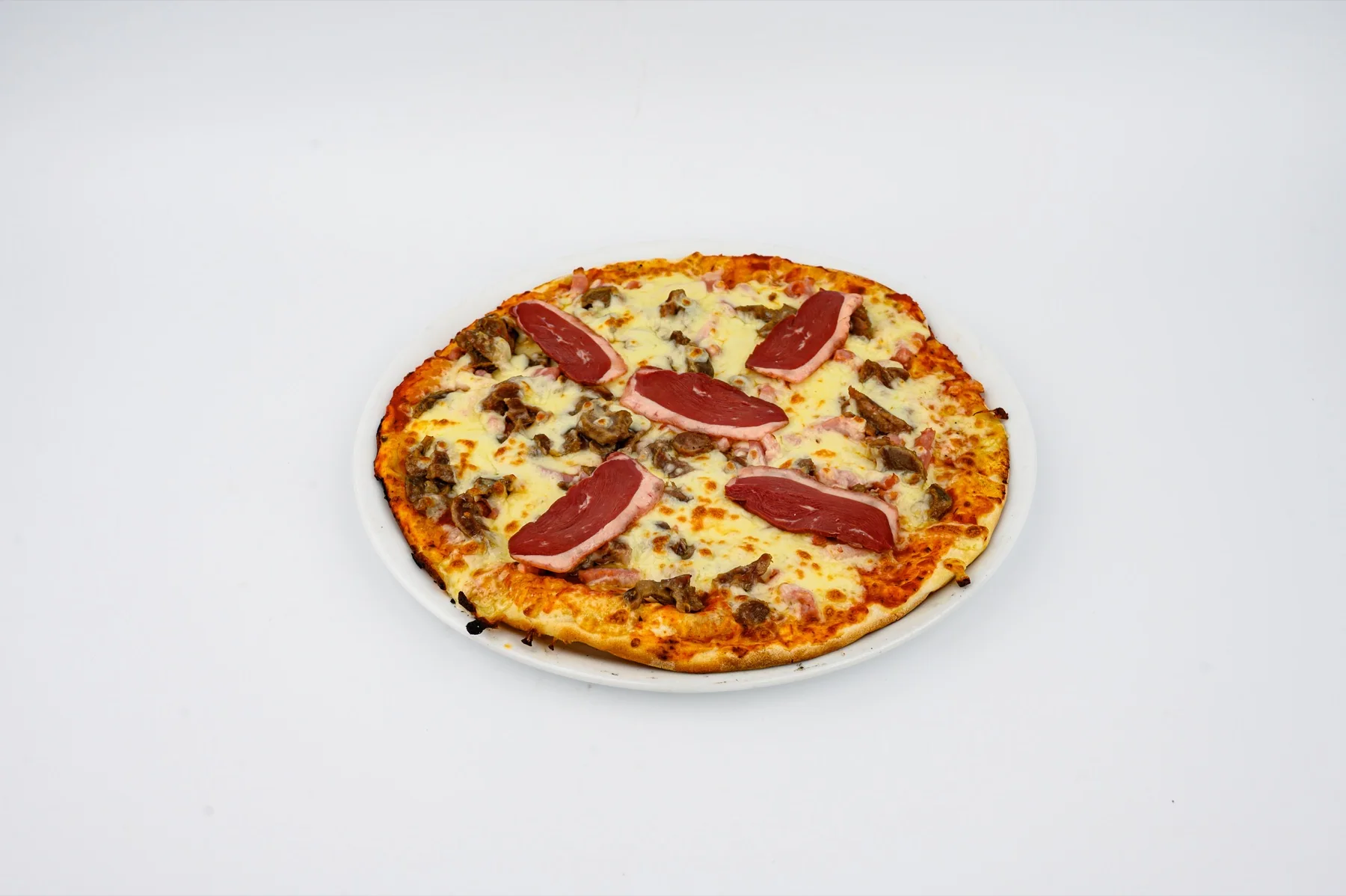 Pizza maison garnie de la Brasserie Lescure